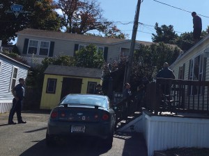 Suspect Surrenders from Peabody Rooftop After Pursuit Up Route 1